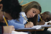 students doing desk work